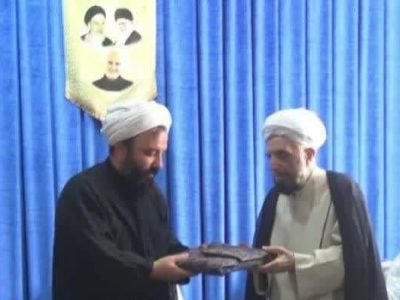 اهداء قرآن دست نویس کاتب هشترودی به موزه کربلا